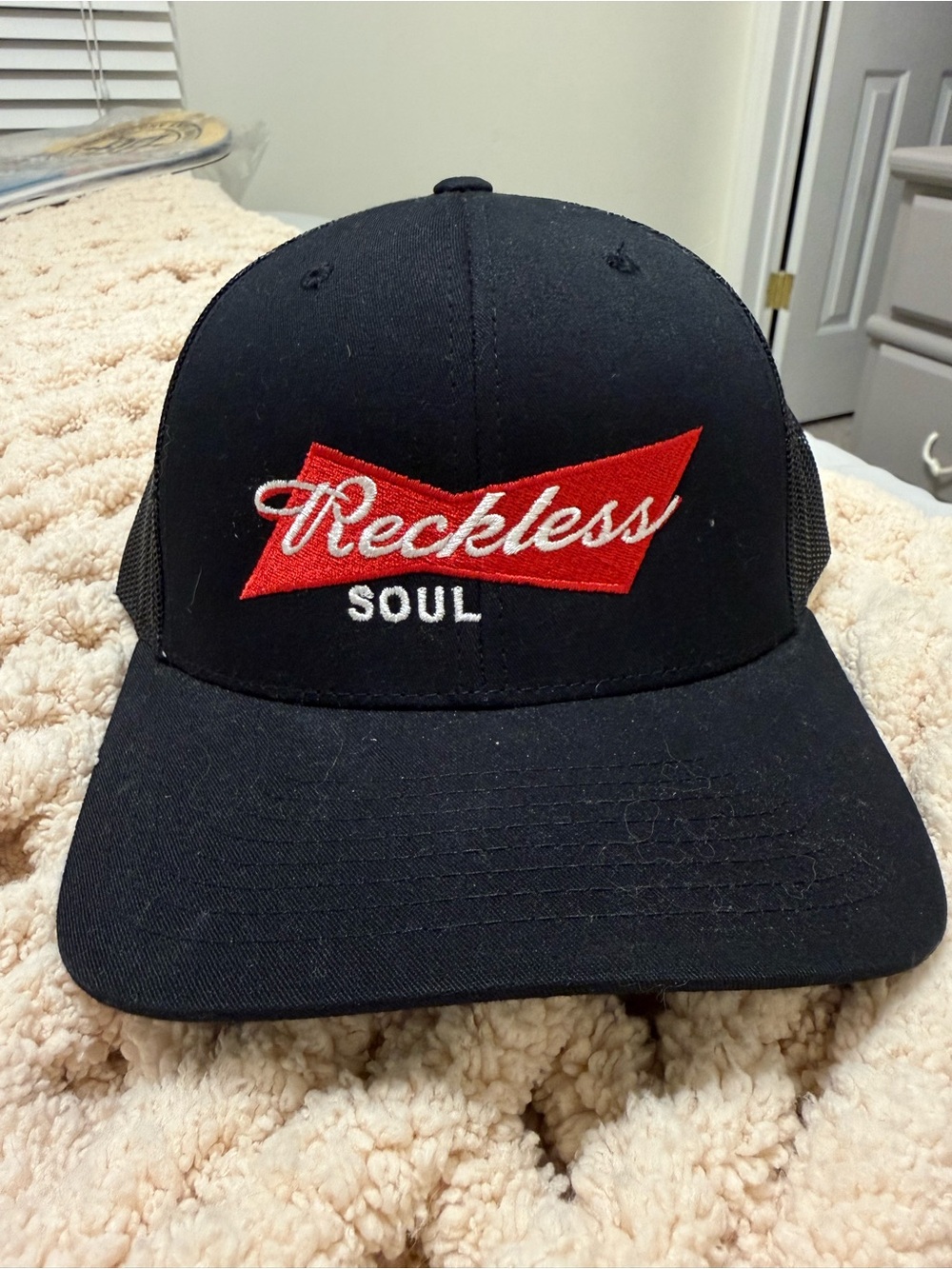 Reckless Soul Black Trucker Hat with Red Logo
